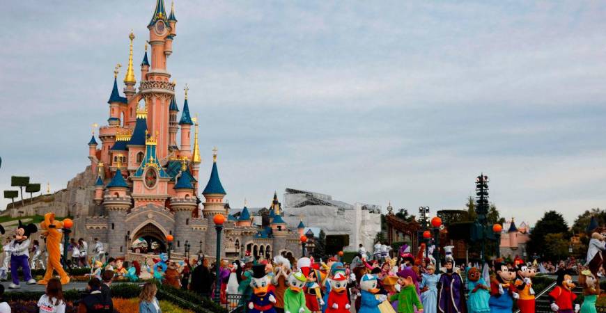 For visual purposes only- Disney cast members take part in a parade during a ceremony marking the 100th anniversary of the Walt Disney Company, held at Disneyland Paris, in Marne-la-Vallee, east of Paris, on October 16, 2023.AFPpix