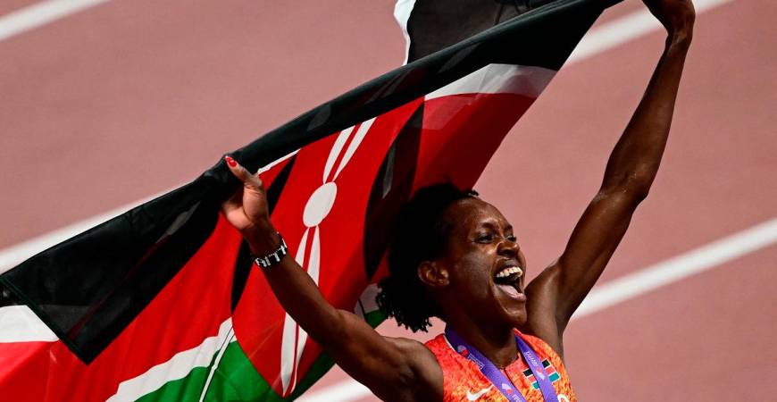 Kenya’s Faith Kipyegon celebrates after winning the women’s 1500m final. - Yuichi YAMAZAKI / AFP