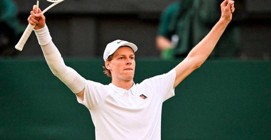 Italy’s Jannik Sinner celebrates after victory against Spain’s Carlos Alcaraz at the end of their men’s singles final tennis match on the fourteenth day of the 2025 Wimbledon Championships at The All England Lawn Tennis and Croquet Club in Wimbledon, southwest London, on July 13, 2025 - PHOTO BY Kirill KUDRYAVTSEV / AFP