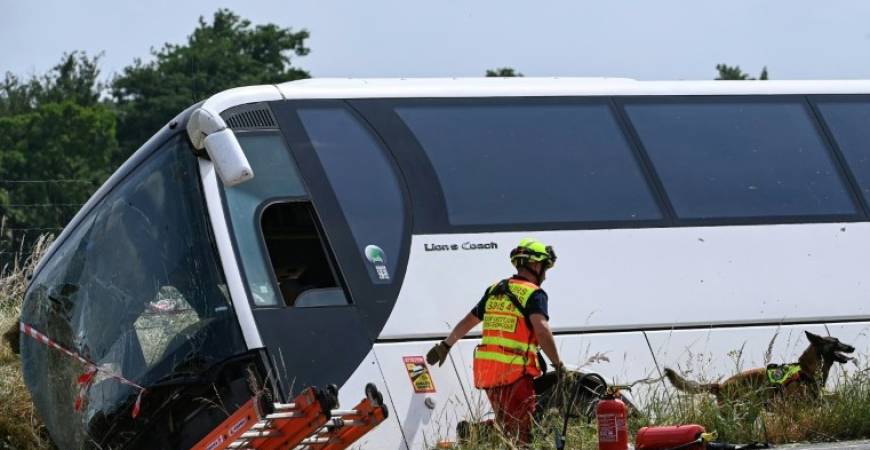 The group of Ukrainian adults and teenagers was travelling back to Ukraine after a school exchange trip. - AFPpix