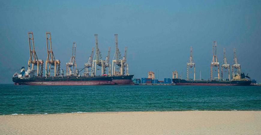 Tankers are seen at the Khor Fakkan Container Terminal along the Strait of Hormuz, a waterway through which one-fifth of global oil output passes on June 23, 2025. (Photo by Giuseppe CACACE / AFP)