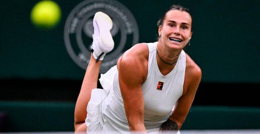 Belarus’s Aryna Sabalenka eyes the ball as she returns it to Belgium’s Elise Mertens during their women’s singles fourth round tennis match on the seventh day of the 2025 Wimbledon Championships at The All England Lawn Tennis and Croquet Club in Wimbledon, southwest London, on July 6, 2025- AFP