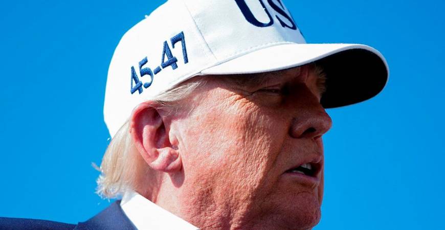 U.S. President Donald Trump speaks to members of the media upon his arrival at Morristown Airport, in Morristown, New Jersey, U.S., July 6, 2025. - REUTERS/Nathan Howard