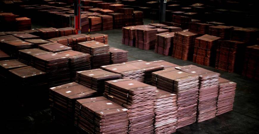 FILE PHOTO: Copper cathodes are seen inside a warehouse near Yangshan Deep Water Port, south of Shanghai March 23, 2012. REUTERS