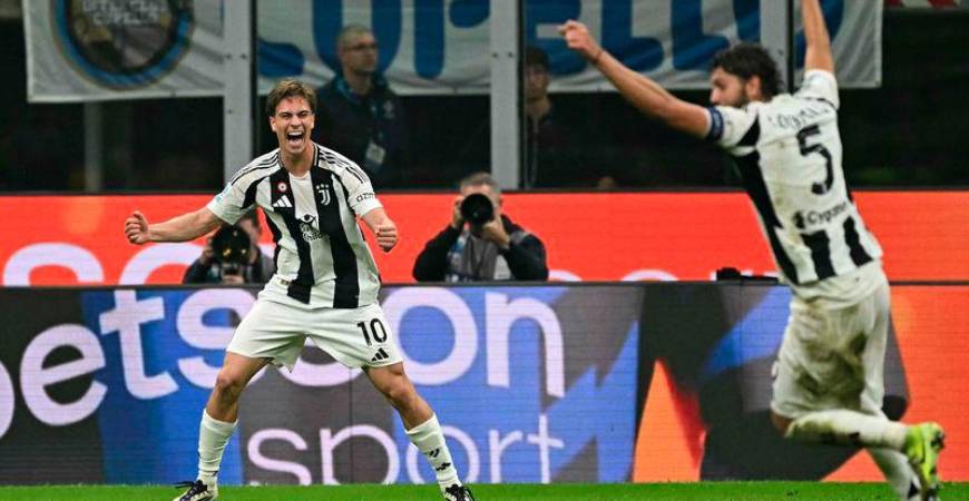 Juventus' midfielder #10 Kenan Yildiz celebrates scoring his team's fourth goal during the Italian Serie A football match between Inter Milan and Juventus at San Siro stadium in Milan, on October 27, 2024. - AFPPIX