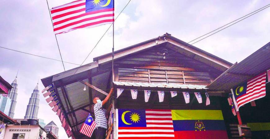 The Jalur Gemilang has always been part of our lives. But now, it feels like the flag has turned into a test. – ADIB RAWI YAHYA/ THESUN