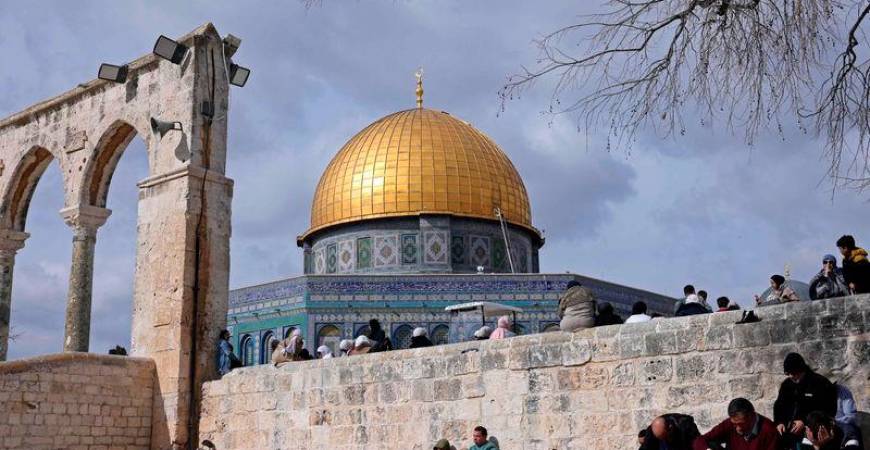 Muslim worshippers prepare to offer Friday Noon prayers at the Dome of the Rock shrine in Jerusalem - AFPpix