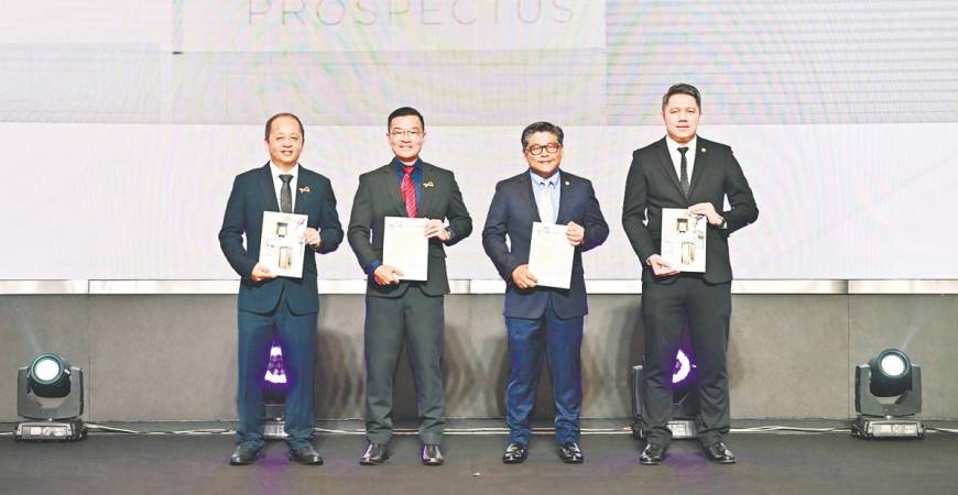 From left: Powertechnic Group executive director Choo Chee Yong, Na, TA Securities Holdings corporate finance head Ku Mun Fong and corporate finance assistant vice-president Chin Wai Kit at the prospectus launch.