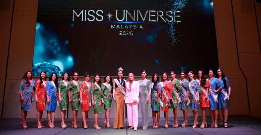 Miss Universe Malaysia 2024 Sandra Lim (in gold), Livonia and Chong with the top 16 finalists at the press conference in Bangsar.
