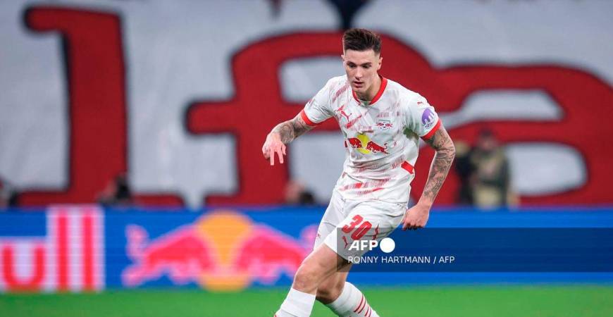Leipzig's Slovenian forward #30 Benjamin Sesko plays the ball during the German first division Bundesliga football match between RB Leipzig and Borussia Dortmund in Leipzig, eastern Germany on March 15, 2025. - AFP