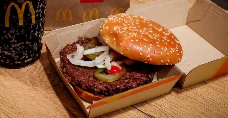 A McDonald's Quarter Pounder hamburger and coke, are seen in an illustration picture taken in New York City, U.S., October 24, 2024. - REUTERSPIX