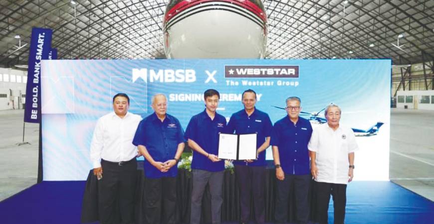 From left: National Aerospace Defence Industries Sdn Bhd (Nadi) president Datuk Edron Hayata Ahmad, Syed Azman, Weststar Group director Syed Muhammad Azni Syed Azman, MBSB Group CEO Rafe Haneef, Wan Kamaruzaman and Nadi Group chairman Tan Sri Ahmad Johan at the MBSB-Weststar MoU signing ceremony.