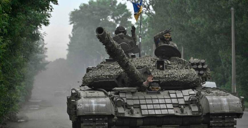 Ukrainian servicemen ride on a tank in Donetsk region on June 28, 2023, amid the Russian invasion of Ukraine. - AFPPIX