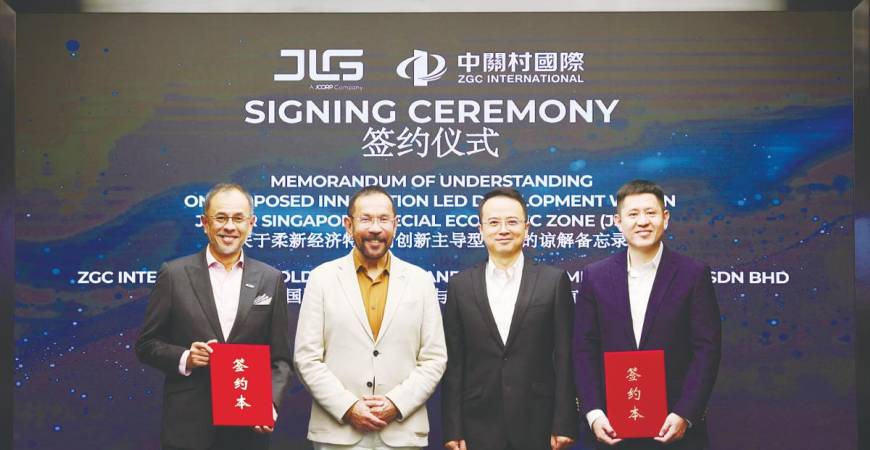 From left: Akmal, Johor Corporation president &amp; CEO, and JLG chairman Datuk Syed Mohamed Syed Ibrahim, ZGC International Holding Ltd chairman Zhou Rui and general manager Lu Jiang.