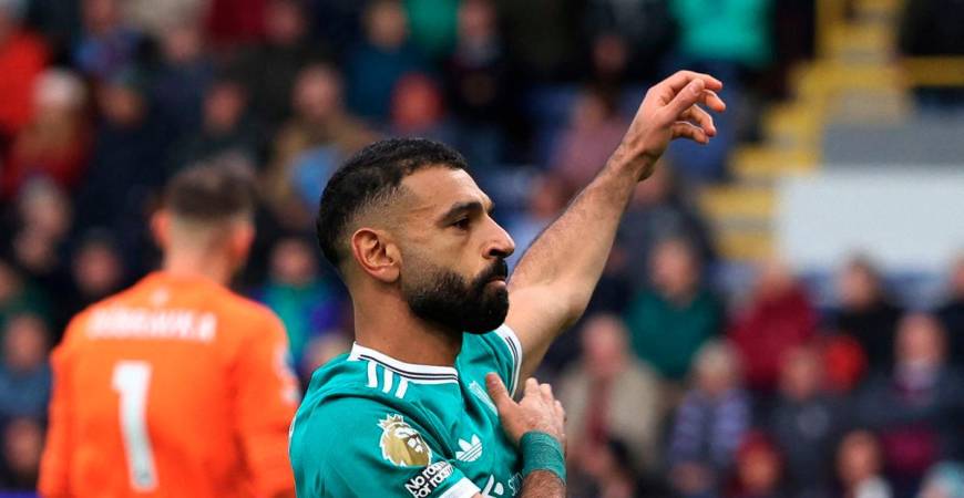 Soccer Football - Premier League - Burnley v Liverpool - Turf Moor, Burnley, Britain - September 14, 2025 Liverpool's Mohamed Salah celebrates scoring their first goal. - REUTERS