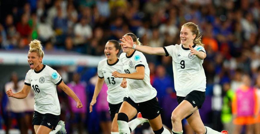 Germany’s Sjoeke Nusken, Germany’s Linda Dallmann and Germany’s Klara Buhl celebrate after winning the penalty shootout REUTERS