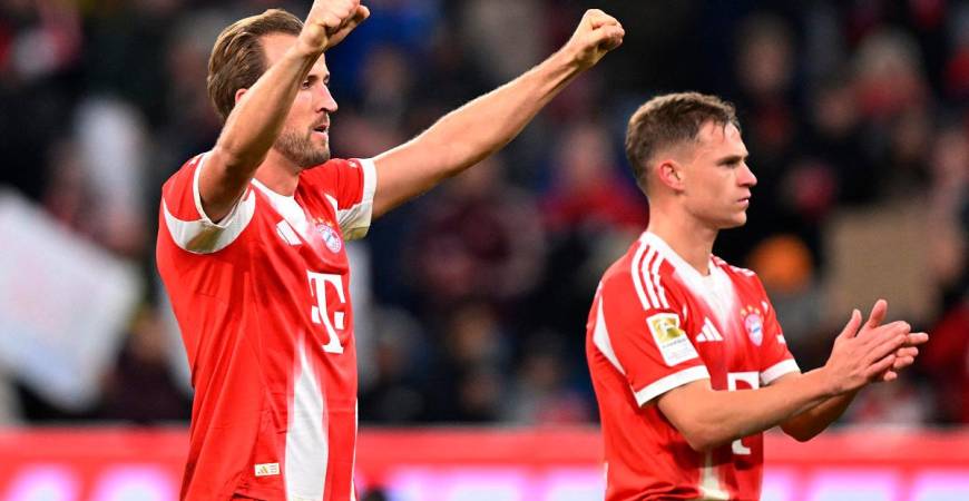 Bayern Munich’s Harry Kane and Joshua Kimmich celebrates after the match. - REUTERS/Angelika Warmuth