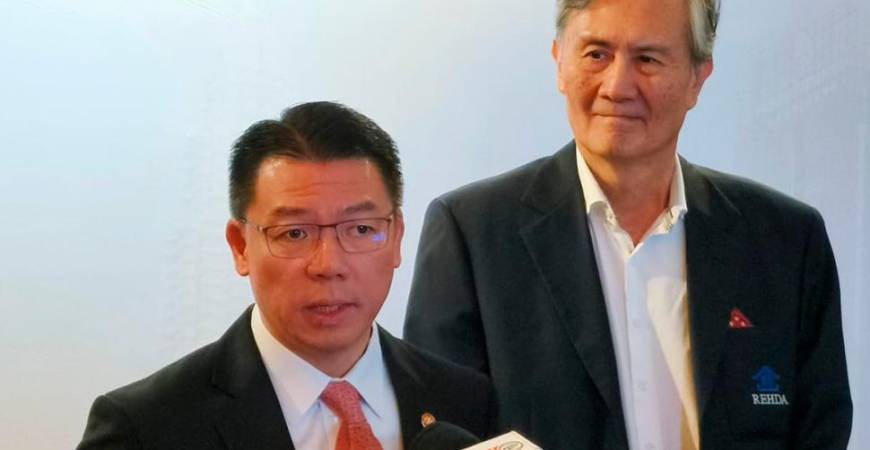 Nga speaking at a press conference at the International Green Build Conference 2025 today. On the right is Rehda Institute chairman Datuk Jeffrey Ng.