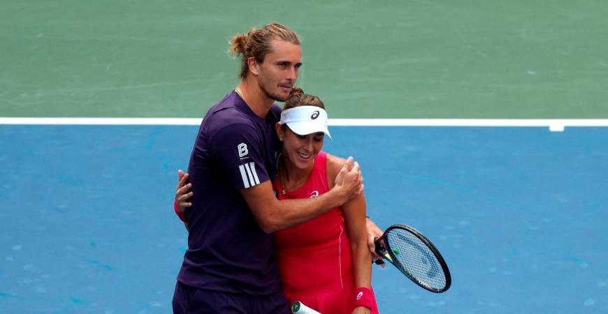 Germany’s Alexander Zverev and Switzerland’s Belinda Bencic react after losing their round of 16 mixed doubles match against Christian Harrison of the U.S. and Danielle Collins of the U.S. REUTERS/Kylie Cooper