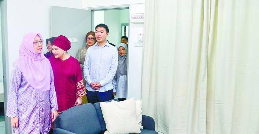 Zaliha (left) visits one of the Residensi Kecapi low-cost housing units. – ADAM AMIR HAMZAH/THESUN