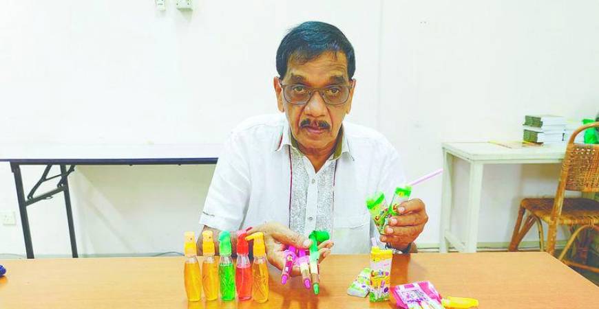 CAP senior education officer N. V. Subbarow with the vape-like sweets. – Pic courtesy of CAP