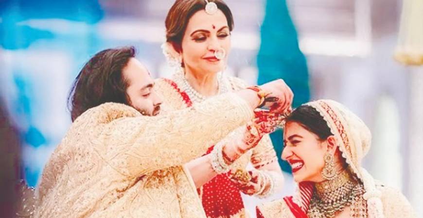 Anant (left) and Radhika sealing the deal. – PIC FROM INSTAGRAM @NITAAMBANI