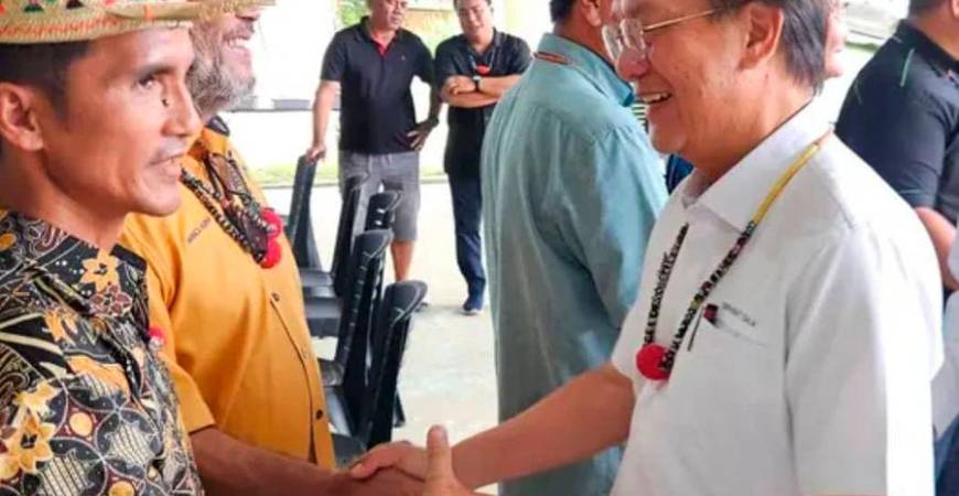 Sarawak Deputy Minister for project monitoring, labour and immigration Datuk Gerawat Gala greeting natives in Long Kevok in Baram district in northern Sarawak. Pix by Datuk Gerawat office