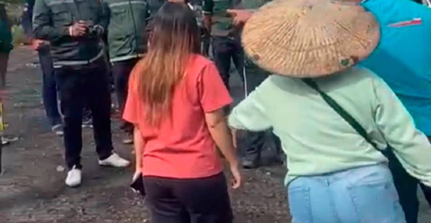 A forestry enforcement team and Penan residents in heated confrontation at a protest in the Long Tepen forest of Baram.