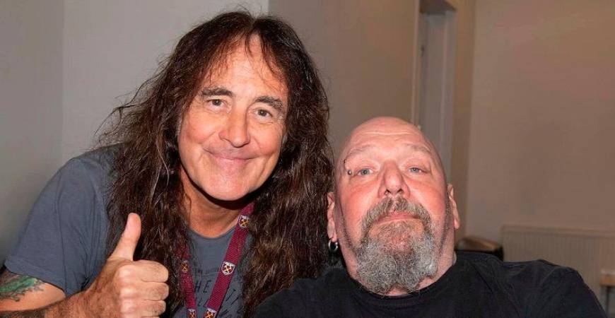 (From left) Harris with Di’Anno who was confined to a wheelchair in his later years but did not stop him from performing live. – PIC FROM FACEBOOK @ IRONMAIDEN