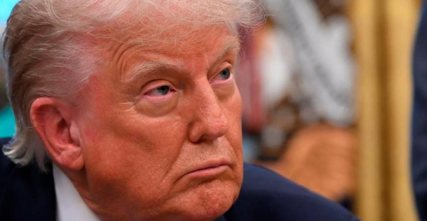 US President Donald Trump speaks to the media while signing executive orders in the Oval Office of the White House, in Washington, DC, on May 5, 2025. -AFPpix