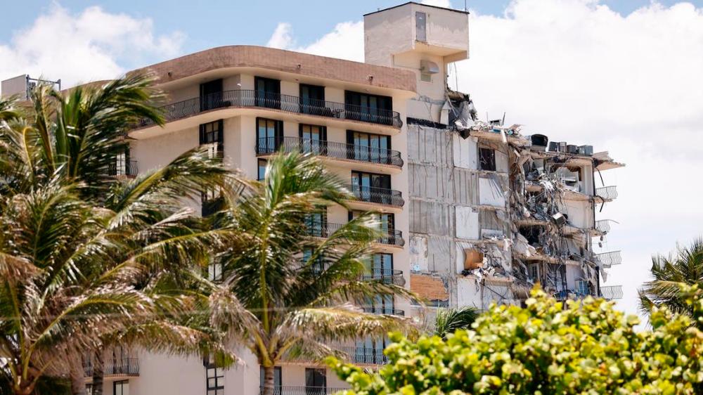 Search and Rescue teams look for possible survivors in the partially collapsed 12-story Champlain Towers South condo building on June 30, 2021 in Surfside, Florida. -AFP