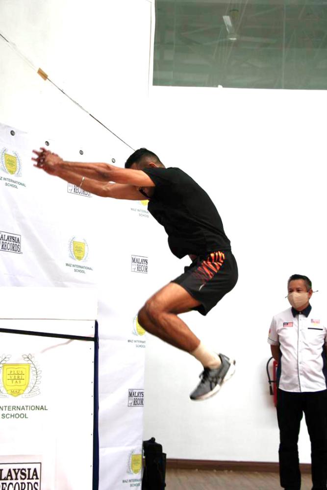 $!Harinder in the midst of breaking the national record. — PHOTO COURTESY OF HARINDER SEKHON