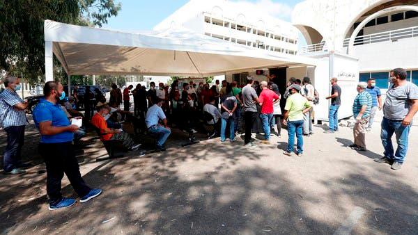 People wait for PCR tests outside Beirut Rafik Hariri University Hospital on Aug 25, 2020. — AFP