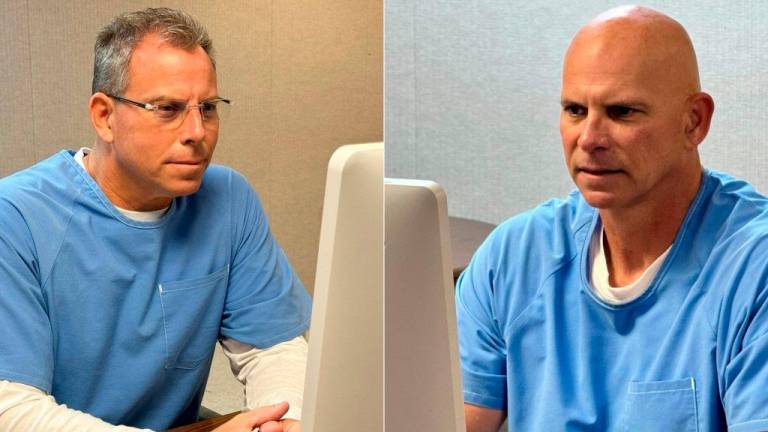 (COMBO) This combination of handout photos released by the California Department of Corrections shows Erik Menendez (L) and Lyle Menendez. - AFP PHOTO / HANDOUT / CALIFORNIA DEPARTMENT OF CORRECTIONS