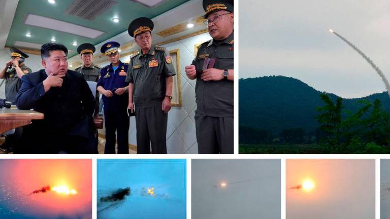 A combination image released by KCNA on August 23 says to show firing tests of anti-aircraft missiles and North Korean leader Kim Jong Un flanked by Korean People's Army officers, at an unknown location. - KCNA via REUTERS