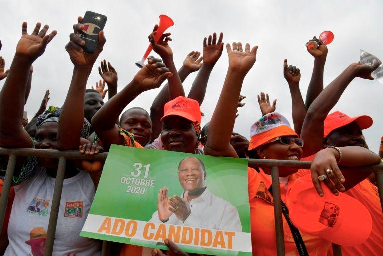 President Alassane Ouattara’s candidacy defying a constitutional 2-term limit was cheered by supporters but led to violent protests. — AFP