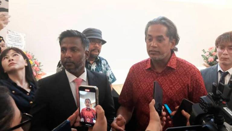 Khairy speaks to reporters after officiating the new Sino Sky Sdn Bhd office at Wisma HLX, Kuala Lumpur, today. - Ikhwan Zulkaflee / theSun