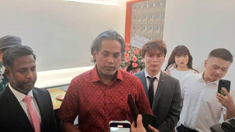 Khairy speaks to reporters after officiating the new Sino Sky Sdn Bhd office at Wisma HLX, Kuala Lumpur, today. - Ikhwan Zulkaflee / theSun