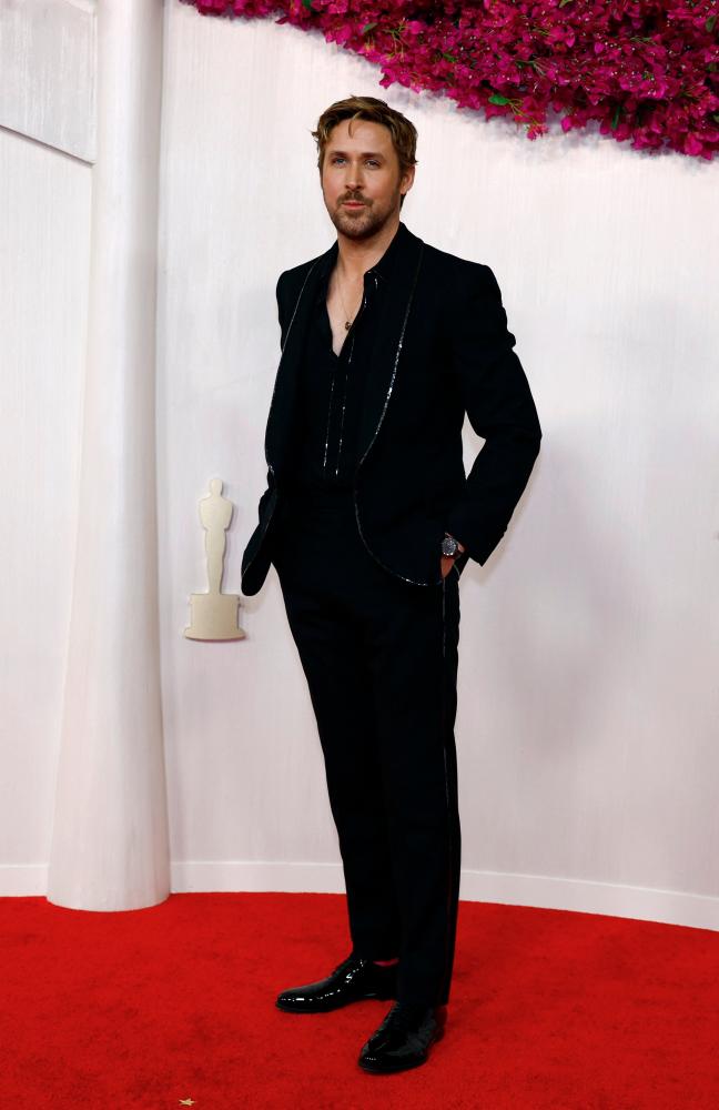 $!Ryan Gosling poses on the red carpet during the Oscars arrivals at the 96th Academy Awards. –REUTERS/Sarah Meyssonnier