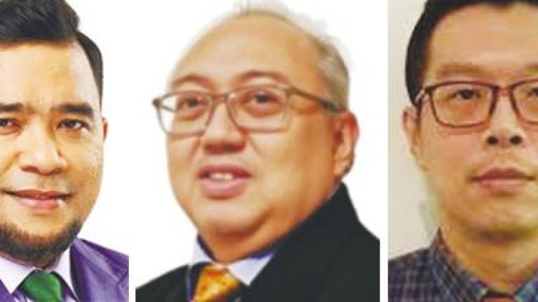 From left: Nazri, Imran Nurginias and Loh.