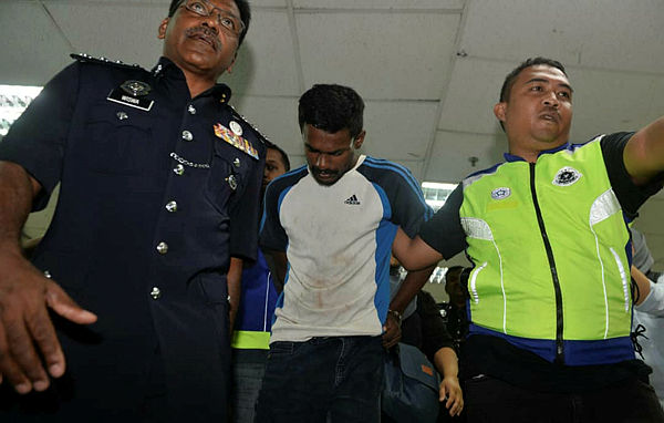 K. Sathiaraj, 27, was arraigned in Magistrate’s Court and Ampang Sessions Court today on three counts of raping, sexually assaulting and killing an 85-year-old elderly woman last month.