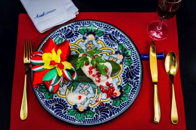 Chile en Nogada, an iconic Mexican dish featuring poblano chile peppers bathed in creamy white sauce and topped with red pomegranate seeds, from the Azul Condesa restaurant in Mexico City. — AFP