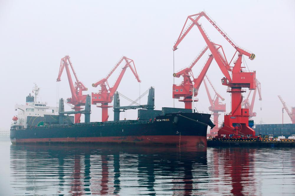 A crude oil tanker is seen at Qingdao Port, Shandong province, China, April 21, 2019. Picture taken April 21, 2019. - Reuters
