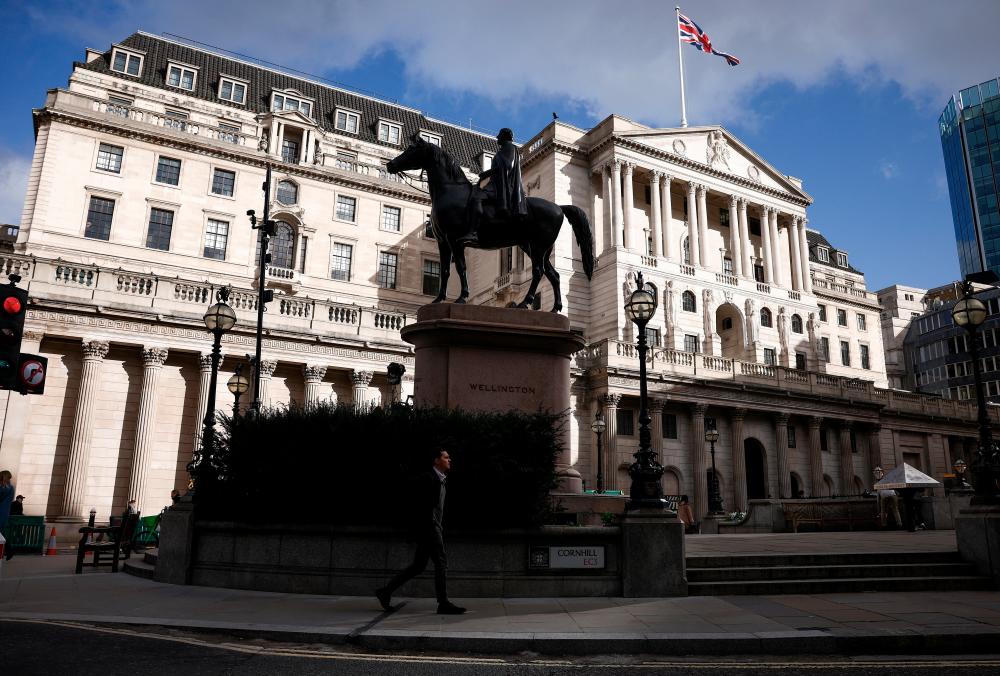 View of the Bank of England in the financial district in London on Thursday, March 23, 2023.The UK central bank raised interest rates by another quarter of a percentage point, adding to the strain on budgets for many households. – Reuterspic