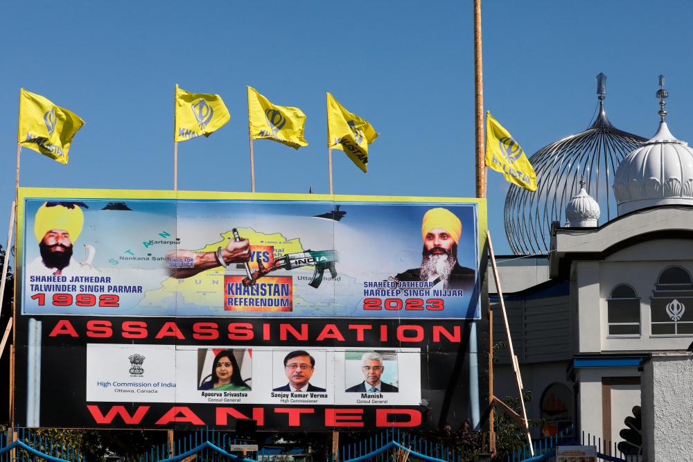 A sign outside the Guru Nanak Sikh Gurdwara temple is seen after the killing on its grounds in June 2023 of Sikh leader Hardeep Singh Nijjar, in Surrey, British Columbia, Canada September 18, 2023. REUTERSPIX