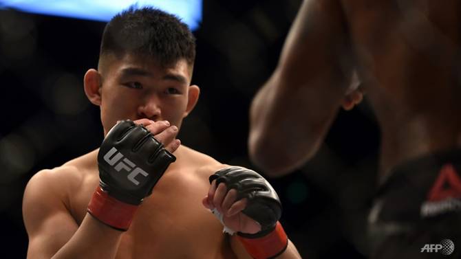 Song Yadong of China competing in last year’s UFC men’s featherweight event in Shanghai. — AFP