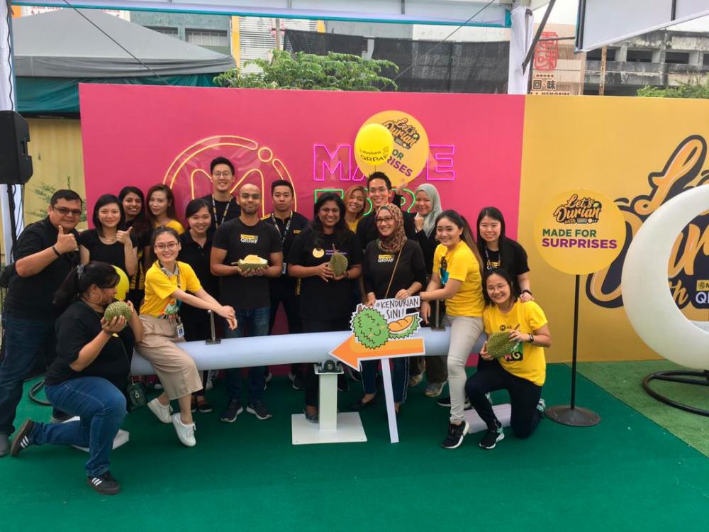 Maybank’s EVP Head of Virtual Banking &amp; Payments Miss Kalyani Nair (centre with holding durian) during the launch of the Durian Party at SS2, Petaling Jaya