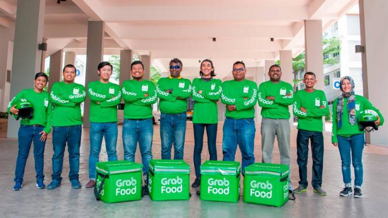 $!GrabFood delivery partners.