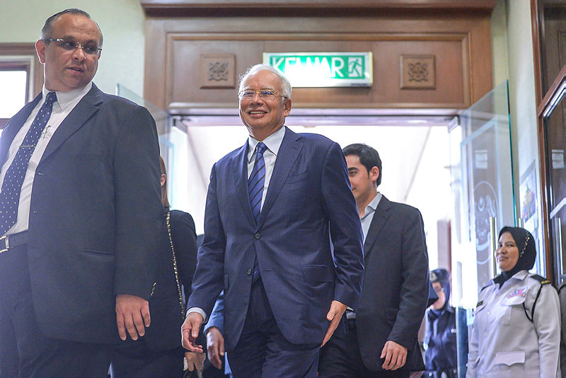 Former prime minister Datuk Seri Najib Abdul Razak arriving at the KL Sessions Court on Dec 12, 2018. — Sunpix by Adib Rawi Yahya