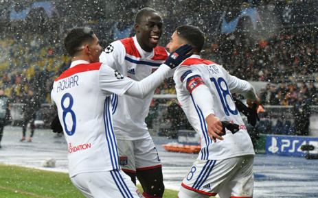 Lyon players celebrate a victory in their UEFA Champions League match against Shakhtar Donetsk on Dec 12 2018